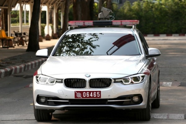 A police car believed to be carrying Bahraini footballer Hakeem Al Araibi is pictured as it leaves the Bangkok's Remand Prison, Thailand, February 11, 2019